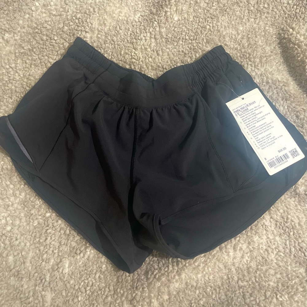 Lulu lemon, size 8, never worn (with tags), 2.5’s, black, lined.